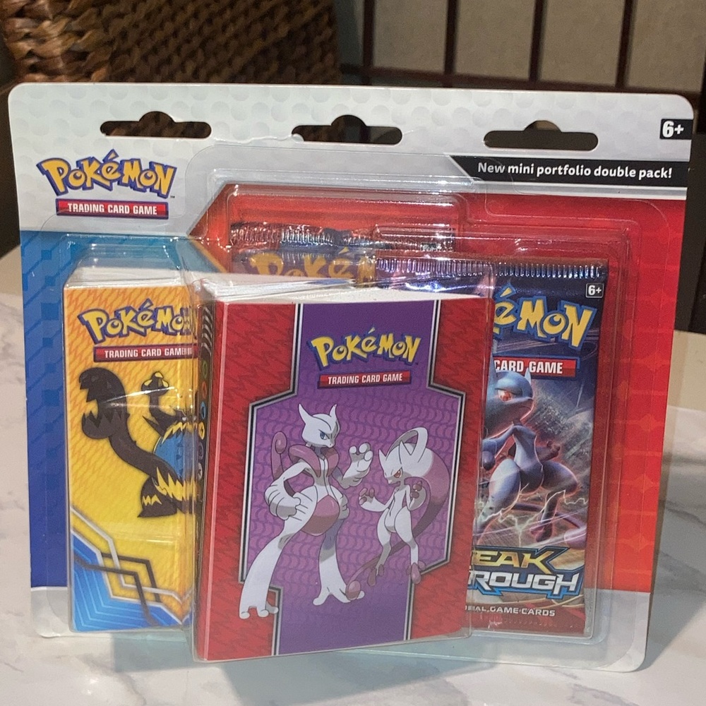 Pokémon TCG: Twin Mini Portfolio & Booster Packs
